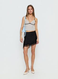   front view of model wearing Princess Polly Idette Lace Asymmetrical Mini Skirt Black Polka Dot Mini Skirts 