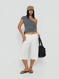 Crafted from ivory the Oren Capri Trouser womens-regular-pants with mid-rise and belt detail view of model wearing Princess Polly