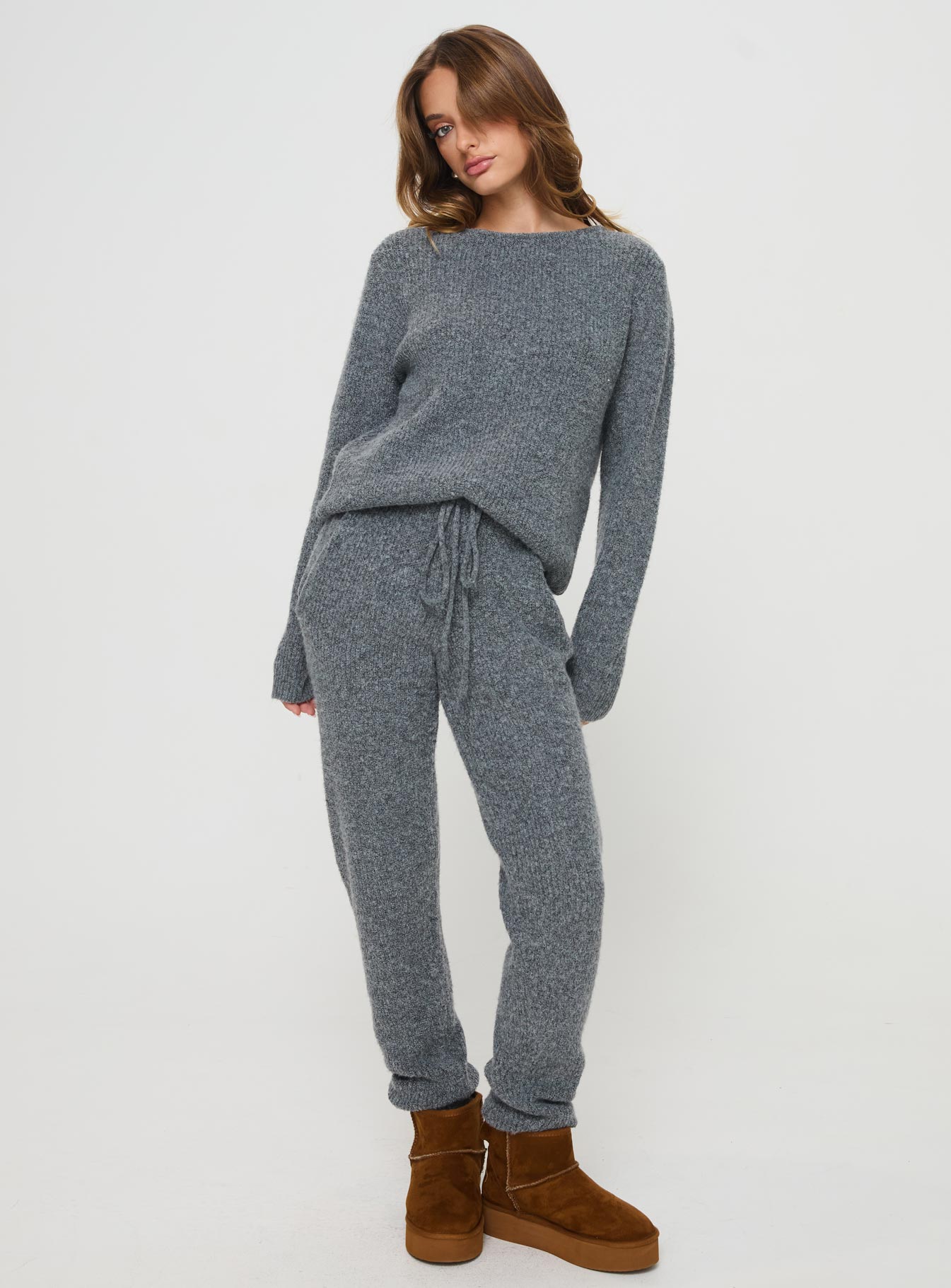 back view of model wearing Princess Polly Abrams Rib Knit Crew Sweater Charcoal Marle regular 