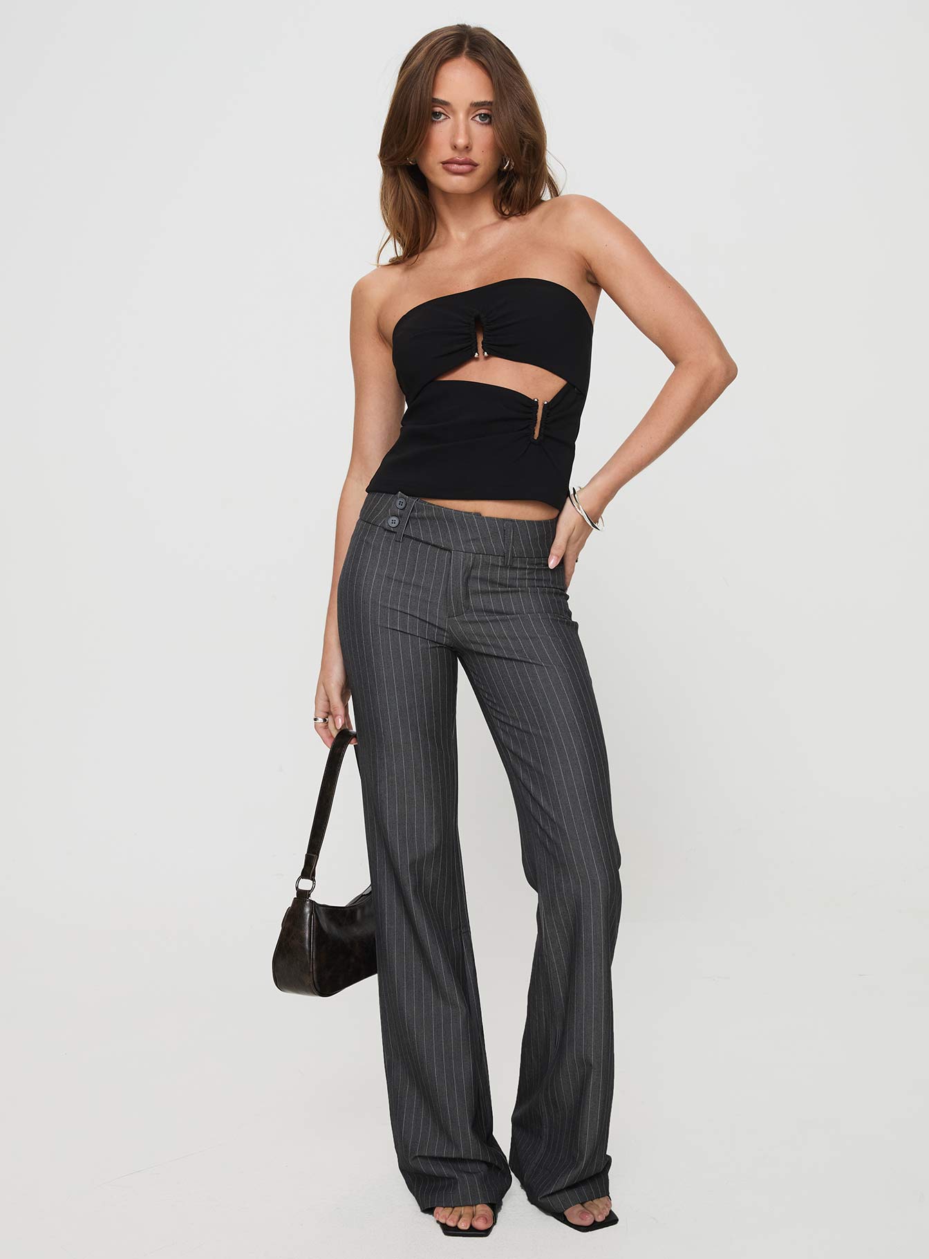 front view of model wearing Princess Polly Kinkirk Flared Pants Grey Pinstripe Tall Low Rise Pants Pants 