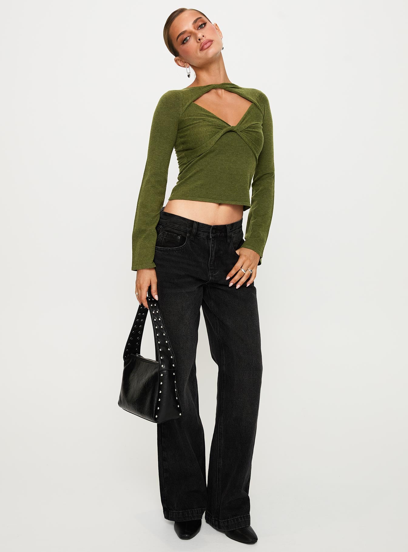 side view of model wearing Princess Polly Giordani Long Sleeve Twist Top Moss Green Full Sleeves Crew Neck 