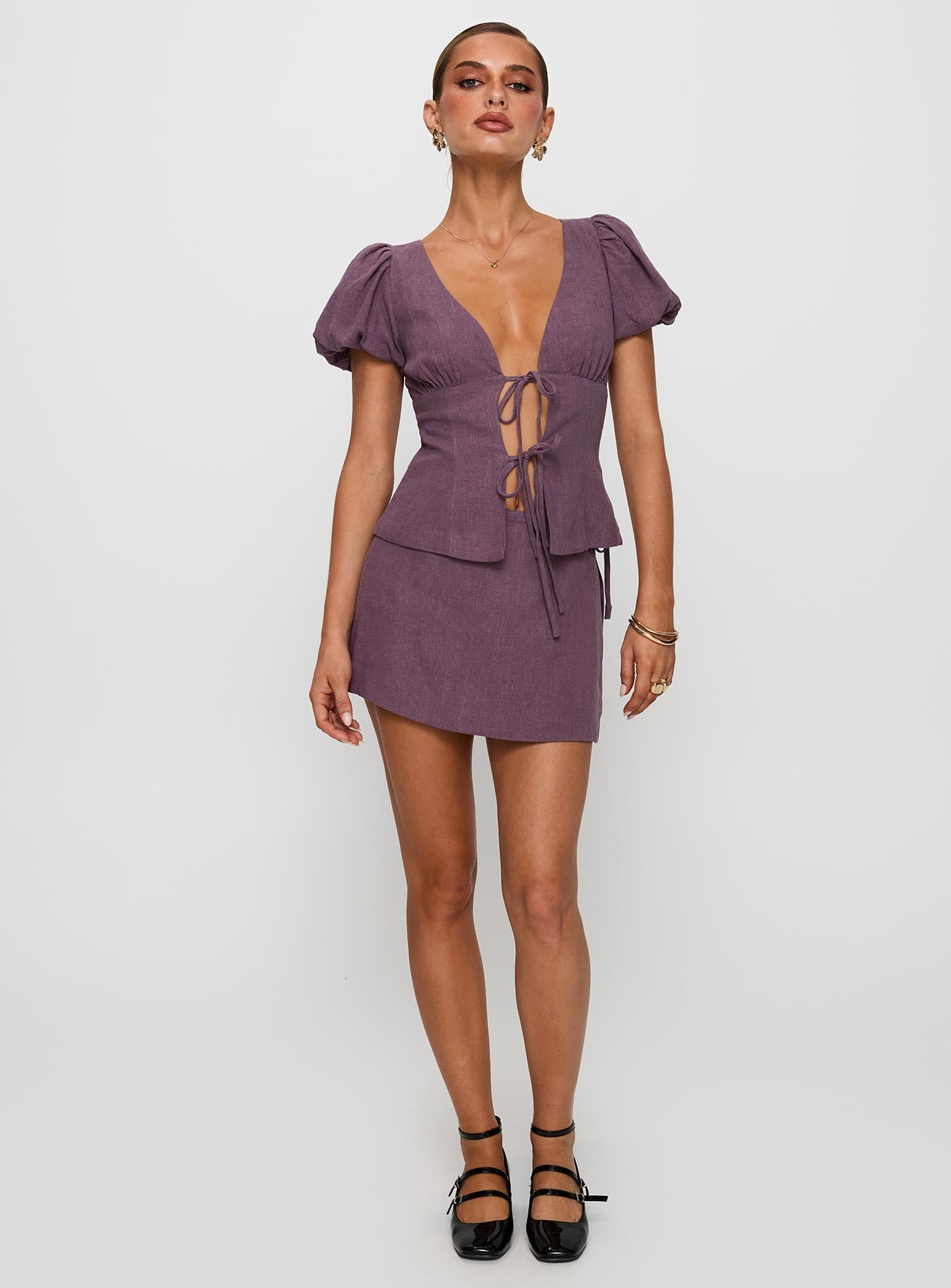 front view of model wearing Princess Polly Gulliver Tie Side Mini Skort Mauve High Waisted Shorts 