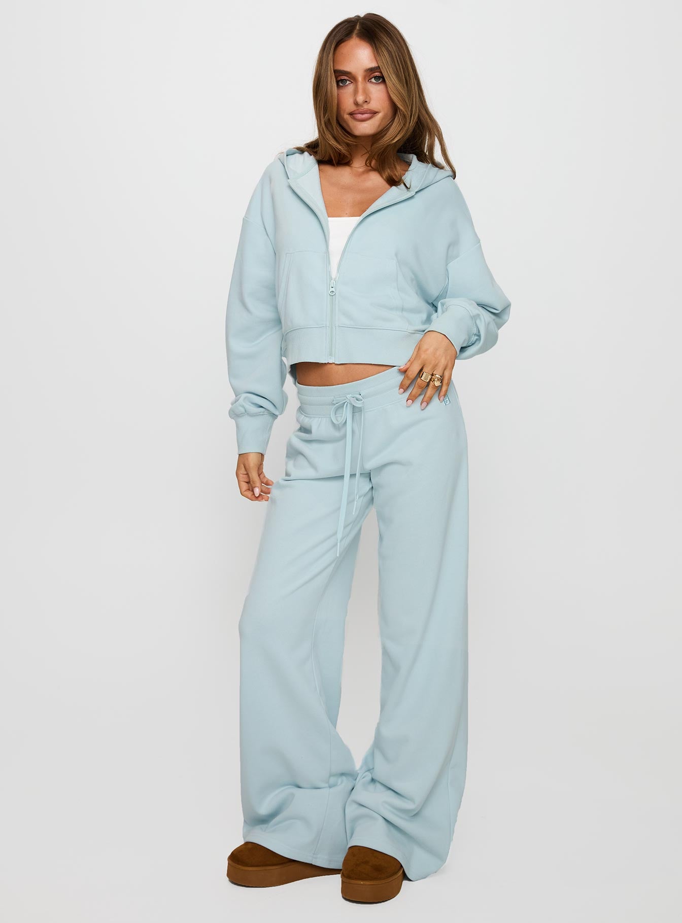 front view of model wearing Princess Polly Revive Zip Through Hoodie Blue cropped 