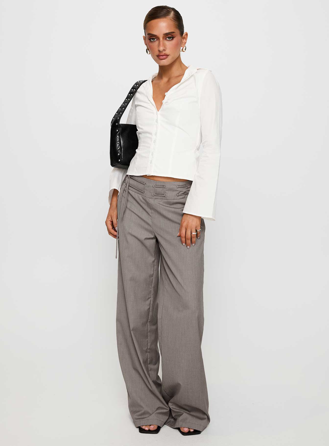 side view of model wearing Princess Polly Just Have Fun Wide Leg Pant Grey Tall High Waisted Pants 