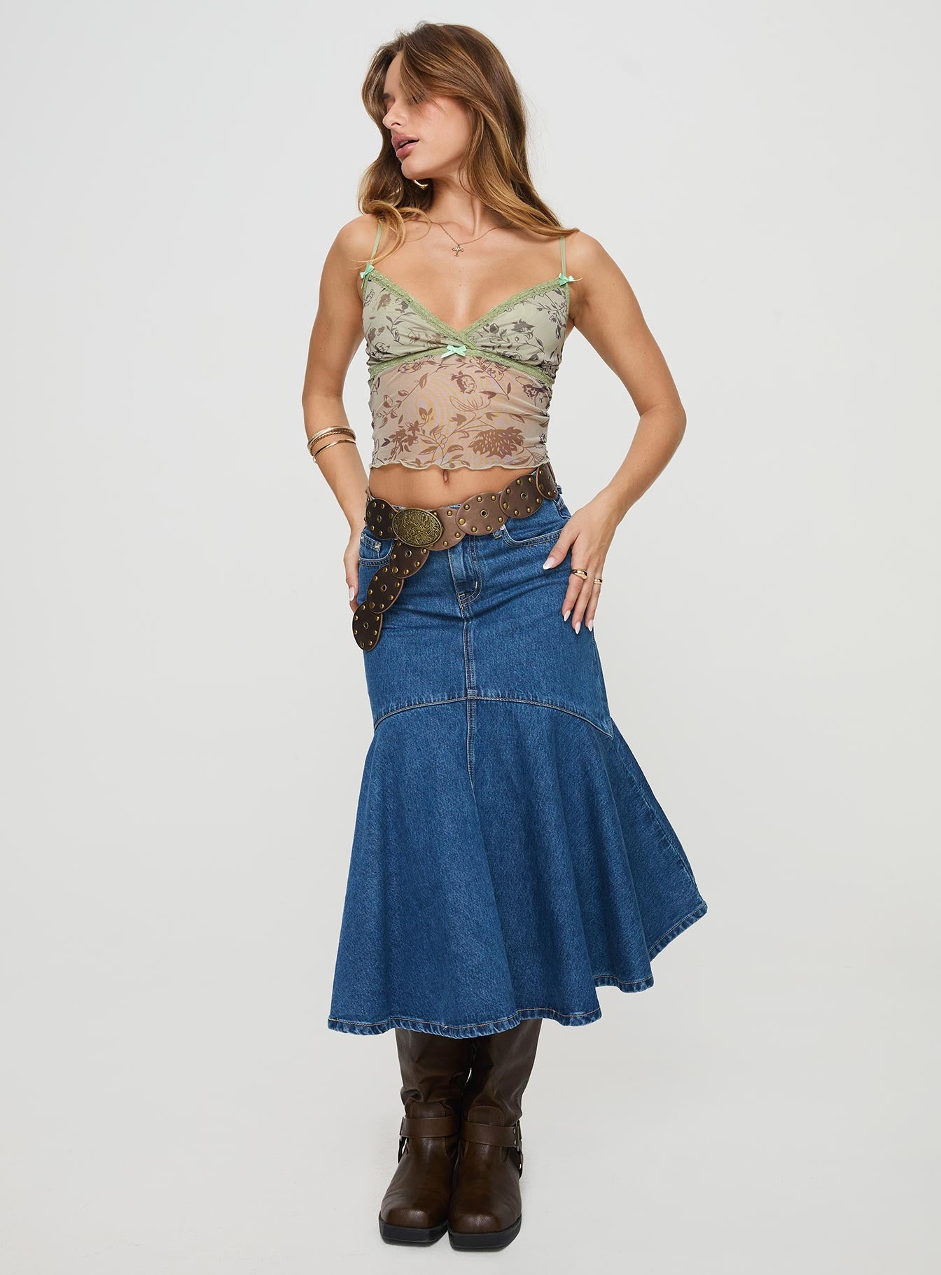 side view of model wearing Princess Polly Shepherd Top Brown Sleeveless Plunger 