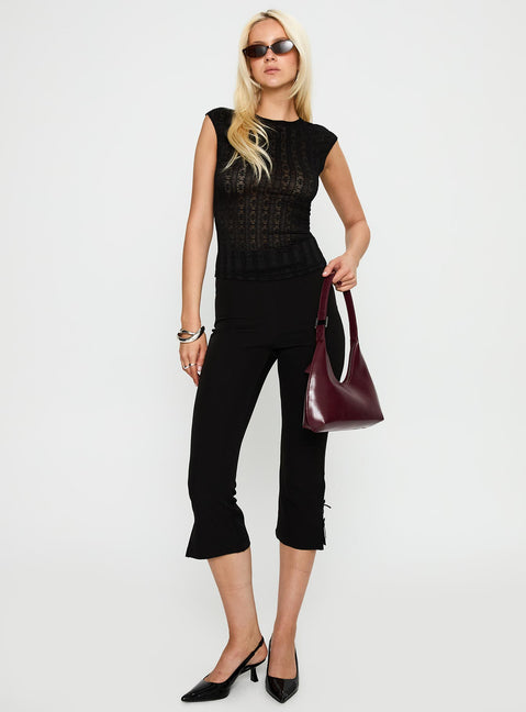 front view of model wearing Princess Polly Keep It Moving Top Black Sleeveless Crew Neck 