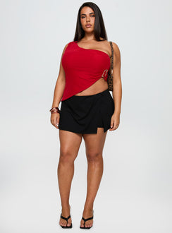 side view of model wearing Princess Polly Machiatto One Shoulder Top Red Curve Sleeveless Asymmetric Neckline 