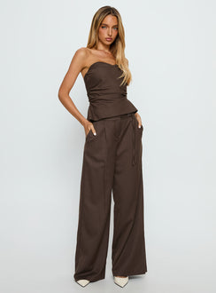 side view of model wearing Princess Polly Natilee Relaxed Tailored Pants Brown Pinstripe Low Rise Pants 