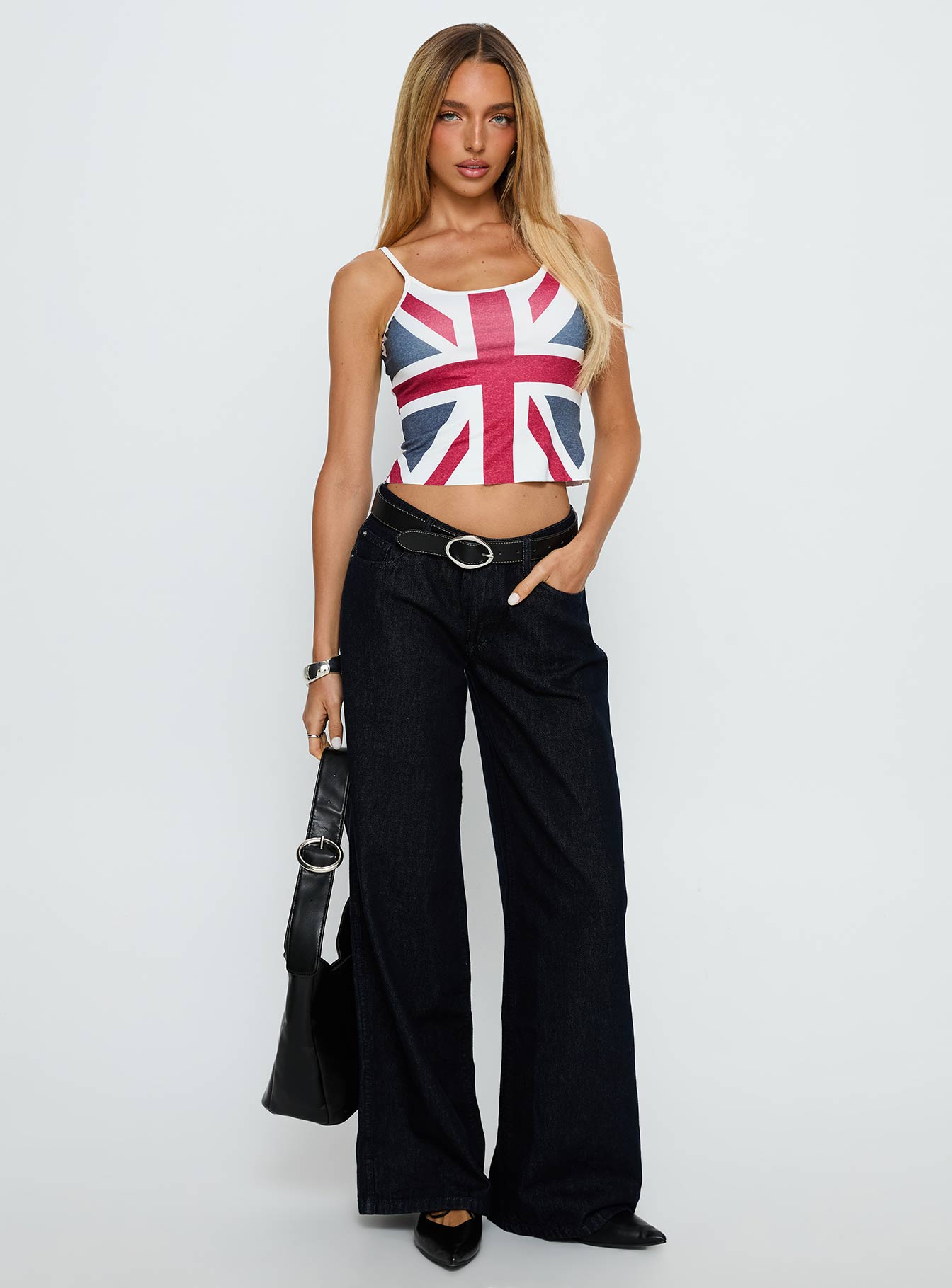 front view of model wearing Princess Polly Ramos Low Rise Wide Leg Jeans Raw Indigo Blue Low Rise Jeans 