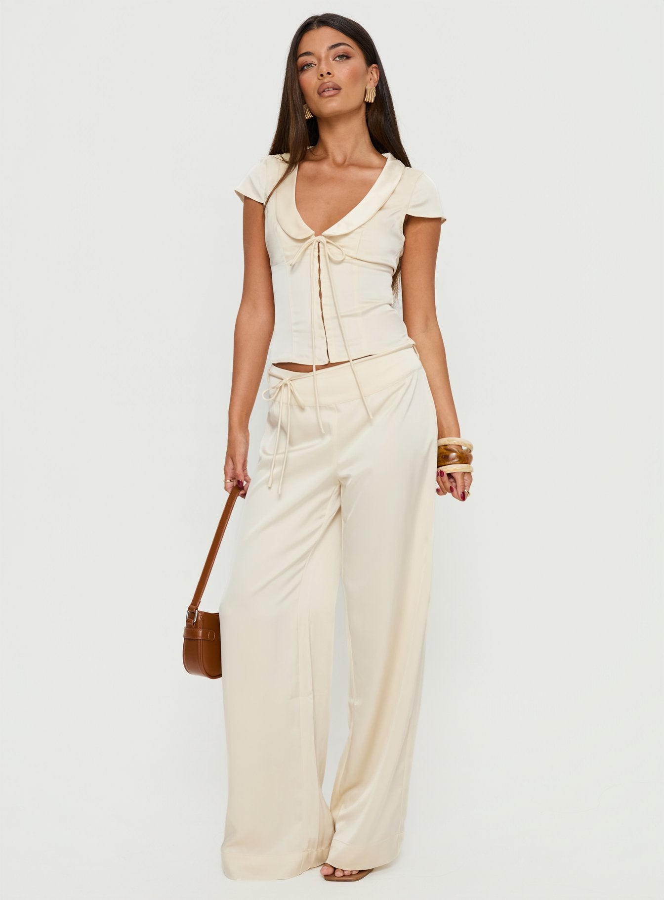 front view of model wearing Princess Polly Aubrette Satin Tie Pants Cream High Rise Pants 