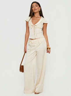 front view of model wearing Princess Polly Aubrette Satin Tie Pants Cream High Rise Pants 