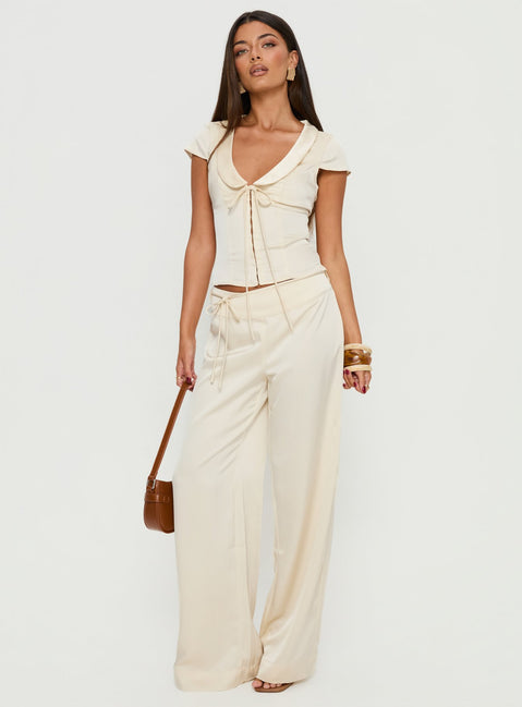 front view of model wearing Princess Polly Aubrette Satin Tie Pants Cream High Rise Pants 