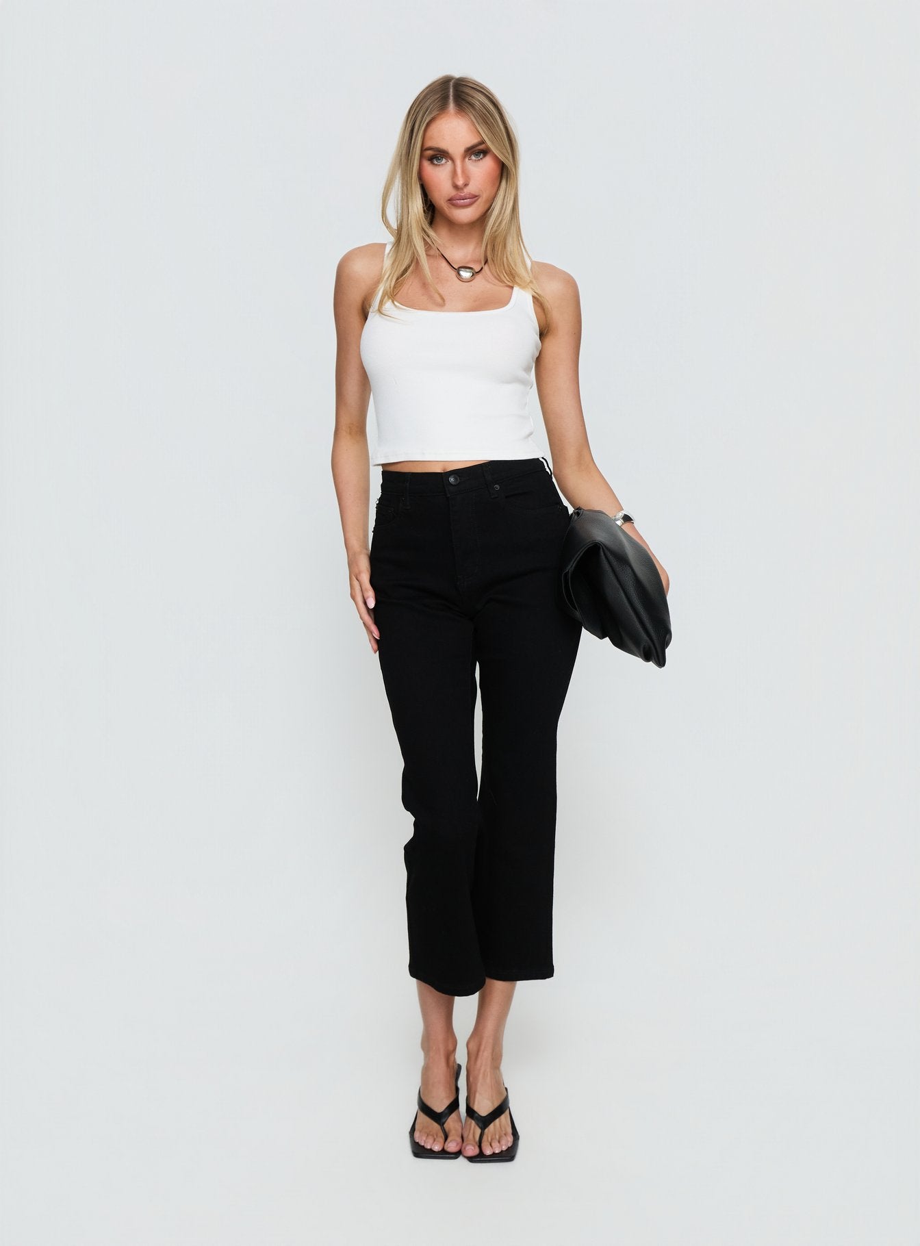 front view of model wearing Princess Polly Cindee High Rise Cropped Jeans Jet Black High Rise Jeans 