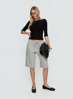 side view of model wearing Princess Polly Kether Longline Basketball Studs Short Grey Marle Mid Rise Pants 