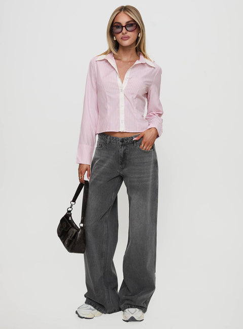 front view of model wearing Princess Polly Ramos Low Rise Denim Jeans Grey Wash Mid Rise 