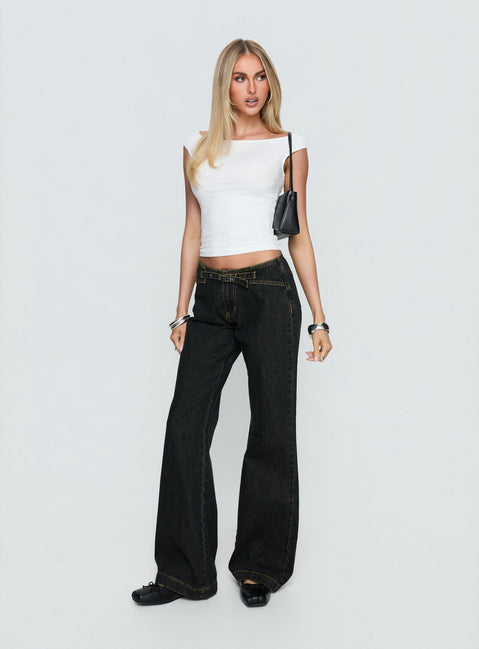 side view of model wearing Princess Polly Slow Ride Mid Rise Bootleg Belted Jeans Grunge Wash Mid Rise Jeans 