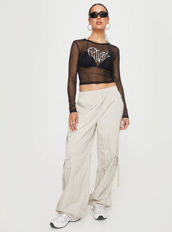 Front view of model wearing  front Princess Polly Sleeveless Square Neck  Future Mesh Long Sleeve Top Black