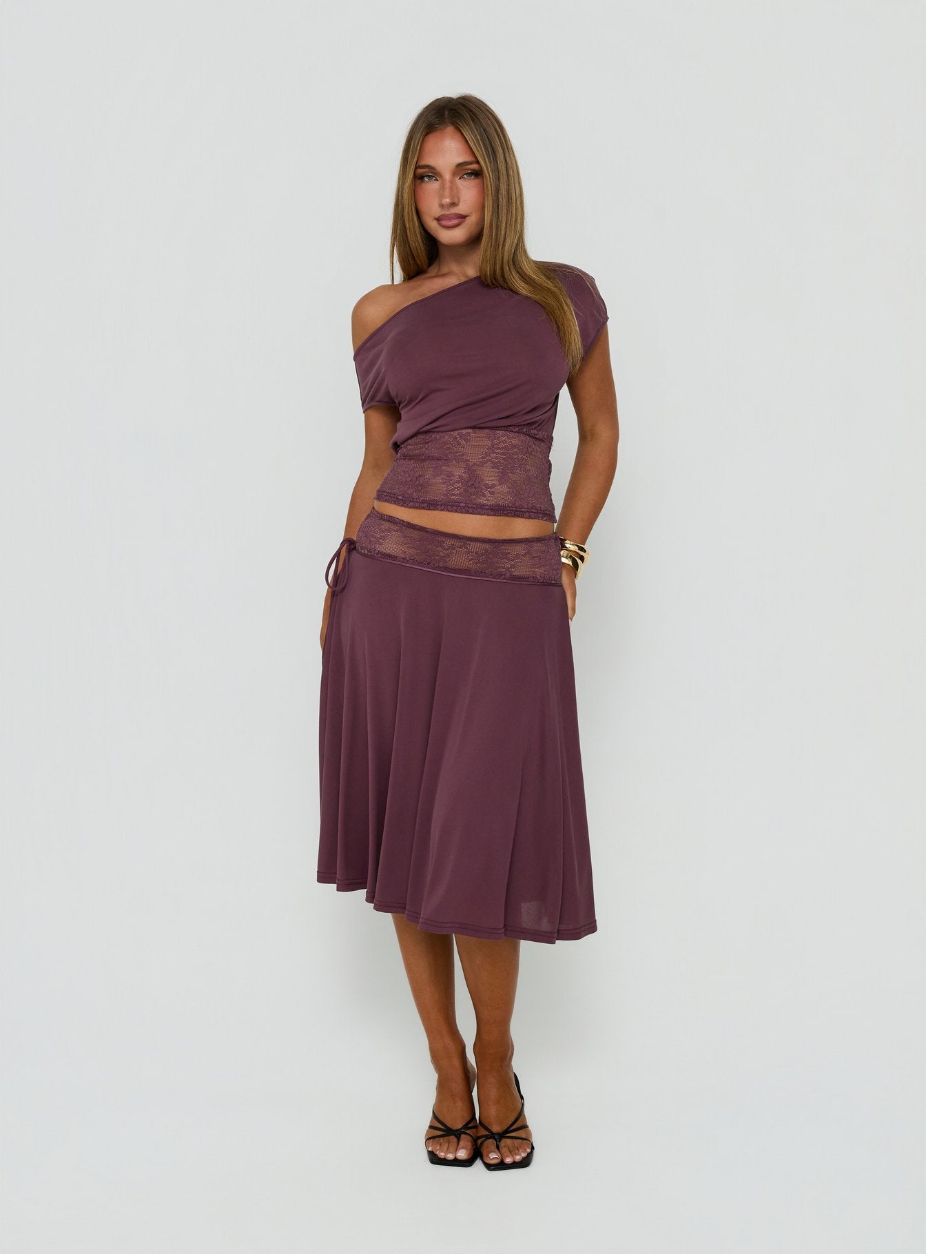 Showcasing the Marienna Lace Midi Skirt Plum in womens-skirts front view of model wearing Princess Polly