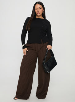 front view of model wearing Princess Polly Khane Low Rise Wide Leg Pant Brown Pinstripe Curve Low Rise Pants 