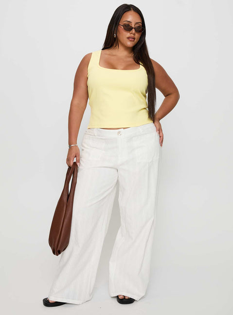 front view of model wearing Princess Polly Baseline Square Neck Rib Tank Top Lemon Curve Sleeveless Square Neck 