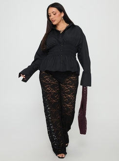 side view of model wearing Princess Polly Peru Lace Pants Black Curve High Waisted Pants 