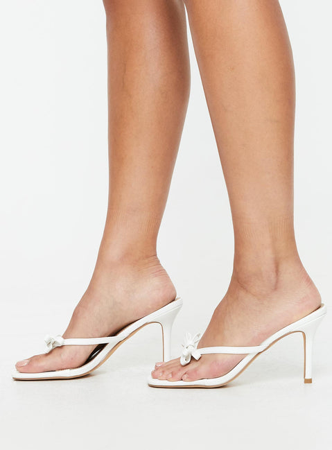 Faux leather heels Slim strappy upper, bow detail, square toe, stiletto heel