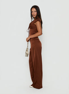 Featuring the Aubrette Satin Tie Pants Chocolate womens-regular-pants with high-rise wide-leg cut side view of model wearing Princess Polly