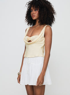   side view of model wearing Princess Polly Cherry On Top Mini Skirt White Mini Skirts Skirts 