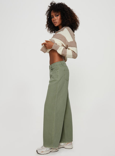 side view of model wearing Princess Polly Ramos Low Rise Denim Jeans Sage Mid Rise Jeans Jeans 