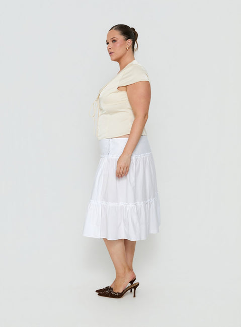 Designed with the Cascades Low Rise Midi Skirt White Curve in womens-skirts with midi length side view of model wearing