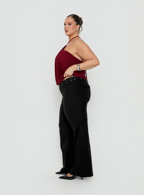 Presenting the Yevina Eyelet Flare Pant Black Curve womens-regular-pants with mid-rise side view of model wearing Princess Polly