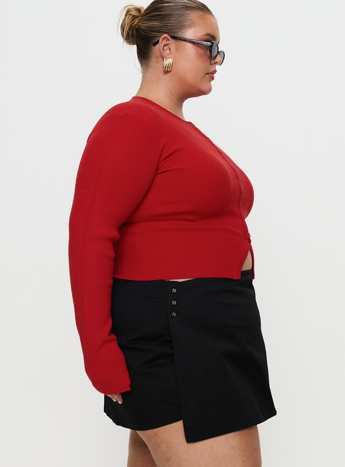 side view of model wearing Princess Polly Suzu Long Sleeve Top Red Curve Full Sleeves Crew Neck 