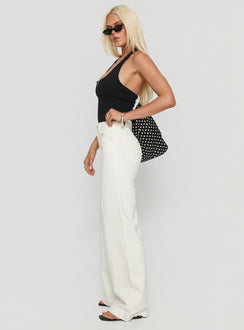side view of model wearing Princess Polly Goldie High Rise Wide Leg Jeans White High Rise Jeans 