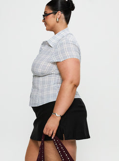 side view of model wearing Princess Polly Can't Sleep Skort Black Curve Low Rise Shorts 