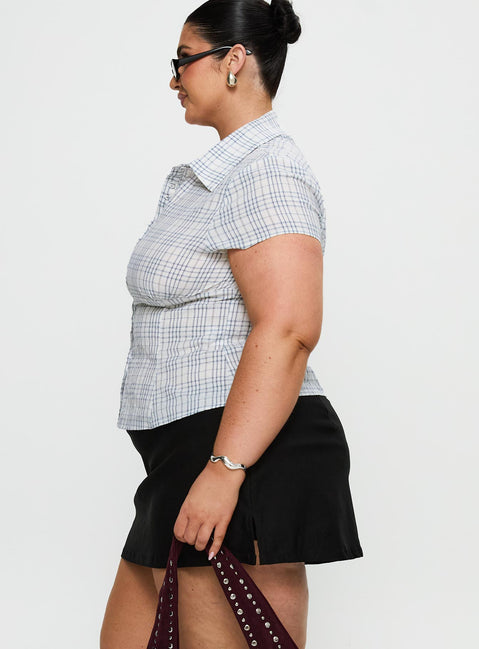 side view of model wearing Princess Polly Can't Sleep Skort Black Curve Low Rise Shorts 