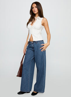 front view of model wearing Princess Polly Hyde Baggy Jeans Mid Blue Low Rise Jeans 