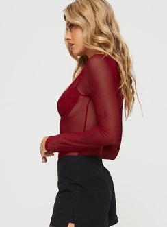 side view of model wearing Princess Polly Leonie Bodysuit Burgundy Long Sleeve Tops 