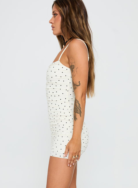 side view of model wearing Princess Polly Gradine Mini Dress Polka Dot Square Neck 
