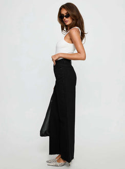 side view of model wearing Princess Polly Henesey High Rise Straight Leg Jeans Jet Black High Rise Jeans 