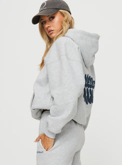 side view of model wearing Princess Polly Princess Polly Hooded Sweatshirt Bubble Text Grey Marle / Slate Jumpers 