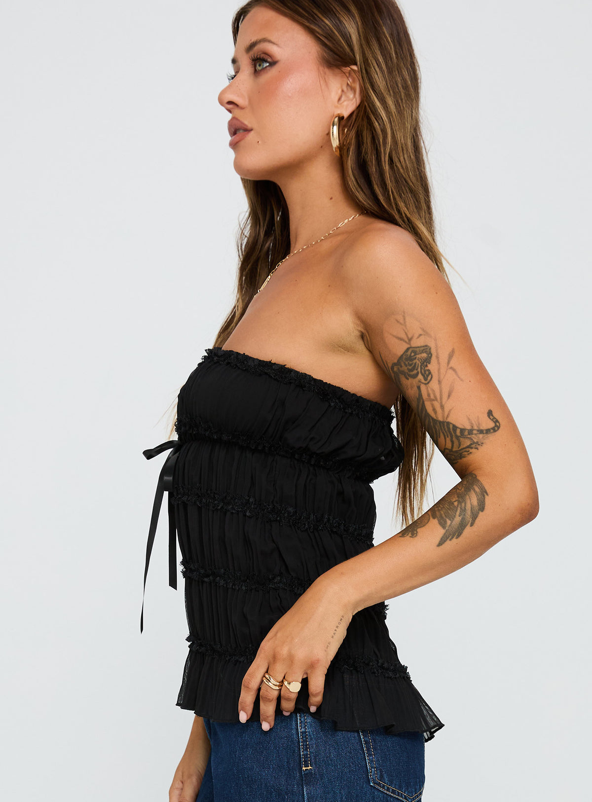side view of model wearing Princess Polly Avelina Strapless Top Black Sleeveless straight 