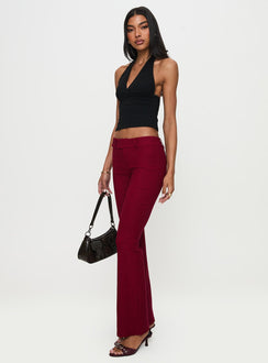 back view of model wearing Princess Polly Kinkirk Flared Pants Burgundy Low Rise Pants Pants 