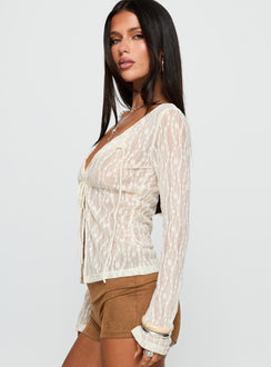 side view of model wearing Princess Polly Open Your Heart Tie Detail Long Sleeve Top Cream Full Sleeves Scoop Neck 