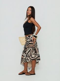 Presenting the Suella Asymmetrical Midi Skirt Zebra in womens-skirts with animal-leopard print and fitted shape side view of model wearing Princess Polly