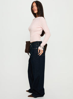 side view of model wearing Princess Polly Serenitia Mid Rise Relaxed Jeans Dark Raw Wash Mid Rise Jeans 