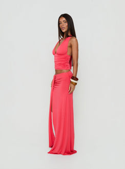 Presenting the Keerah Ruched Maxi Skirt Guava in coral womens-skirts with maxi length side view of model wearing Princess Polly