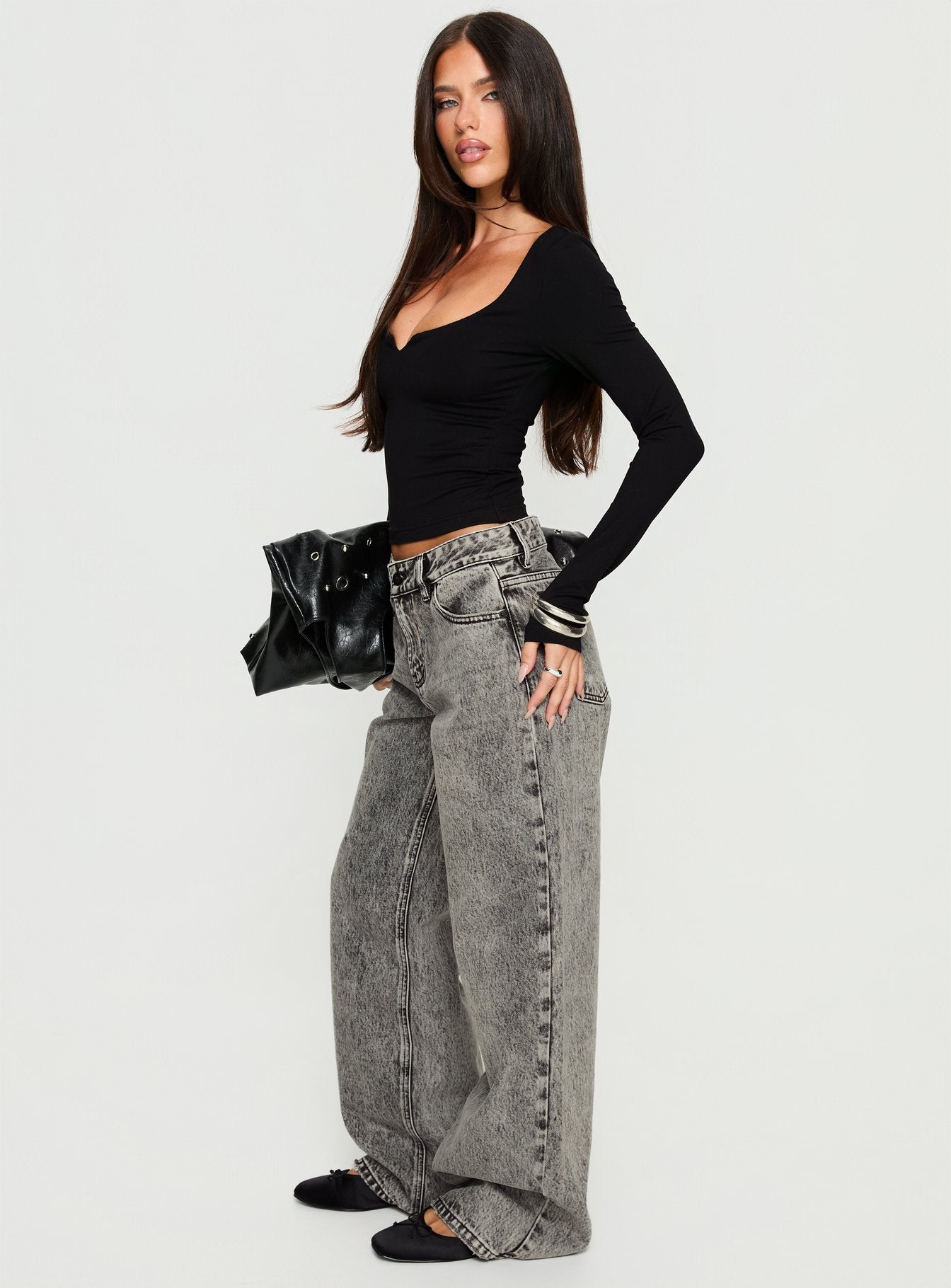 side view of model wearing Princess Polly Serenitia Mid Rise Relaxed Jeans Washed Grey Mid Rise Jeans 