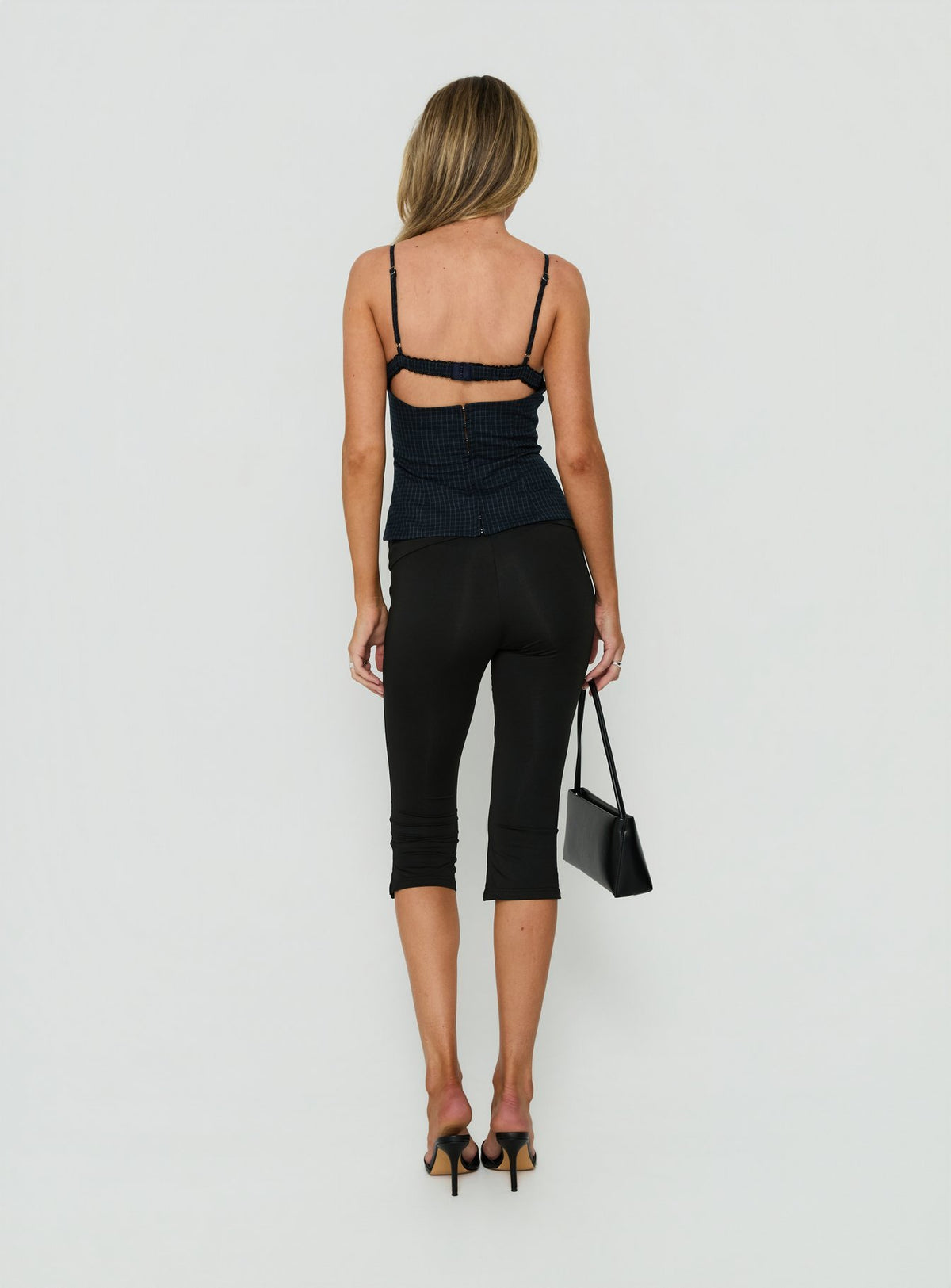 Designed with Avedon Foldover Waist Capri Pants in Black womens regular pants featuring high-rise back view of model wearing Princess Polly