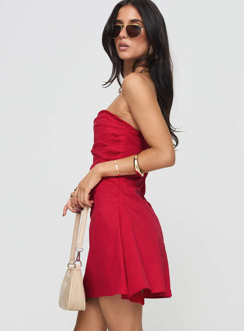 side view of model wearing Princess Polly Bradwell Strapless Mini Dress Red Sweetheart Neckline 