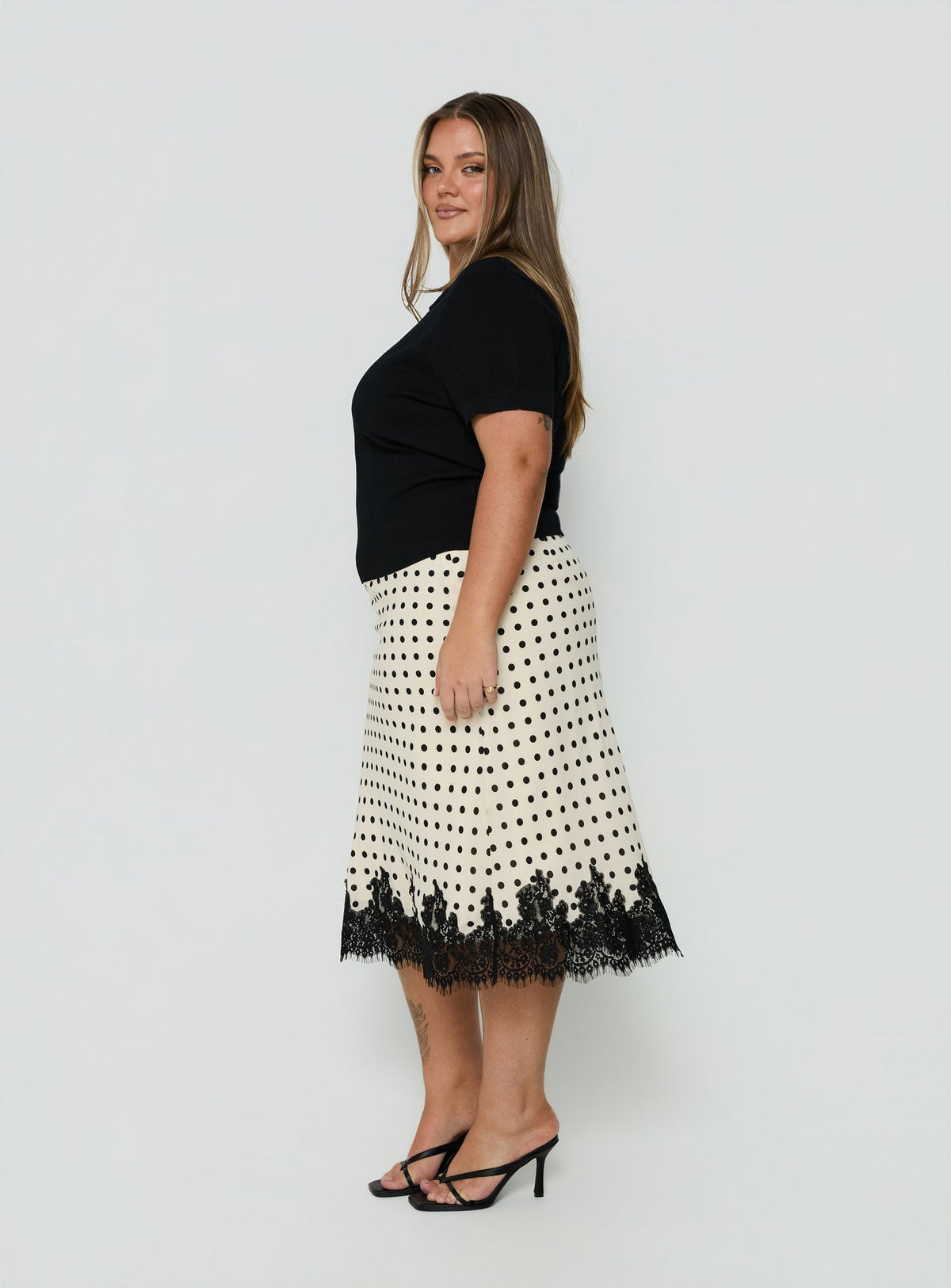 Featuring Downtown Scene Lace Trim Maxi Skirt Cream Polka Curve in womens-skirts with midi length side view of model wearing Princess Polly